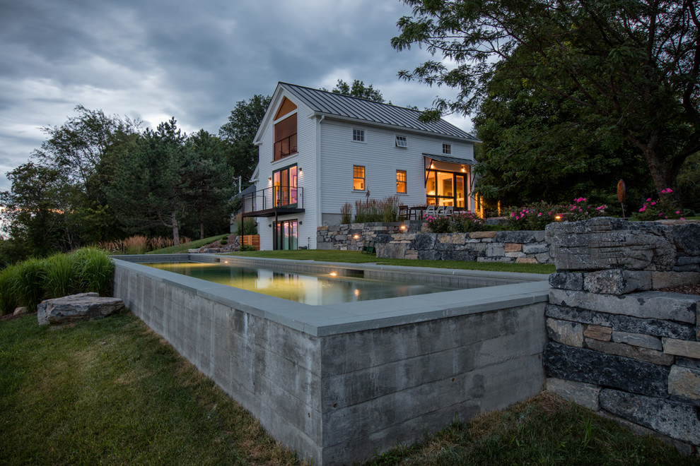 Дизайн гостевого дома в штате Вермонт, США: каменная кладка и клумбы