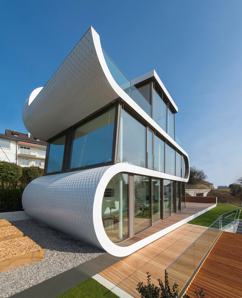Белый необычный проект дома в Швейцарии: паруса