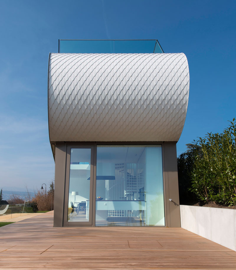 Белый необычный проект дома в Швейцарии: необычный дизайн