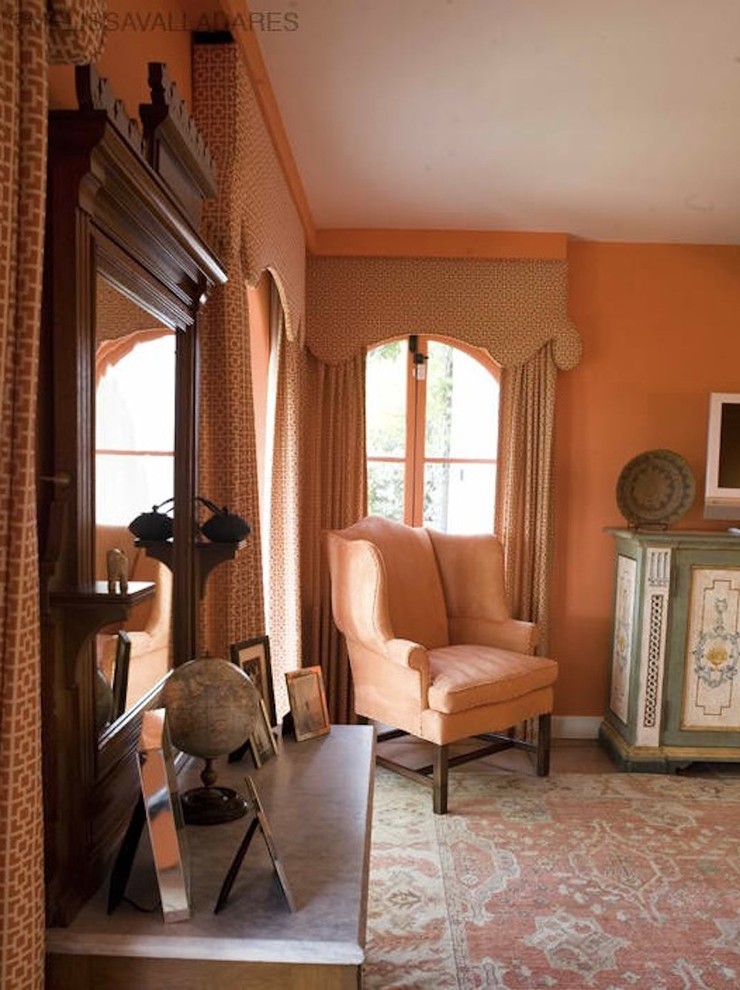 Интерьер комнаты для гостей в оранжевых тонах